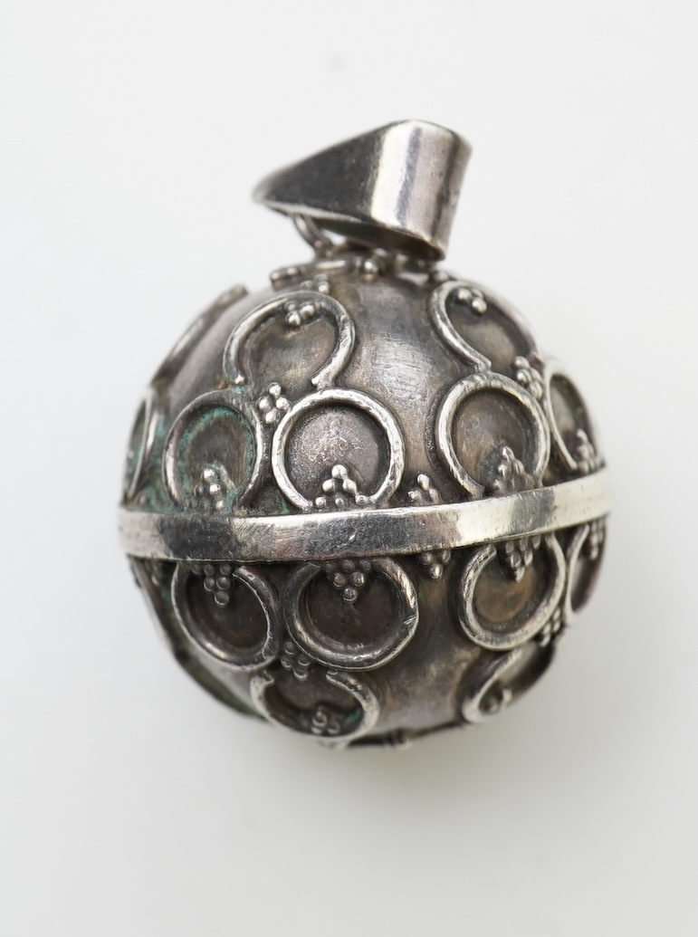 A collection of silver jewellery including a Zuni bangle